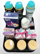 Three Wax Lyrical candles, Pacific Wax candle, three bottles of laundry scent booster,