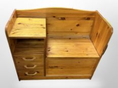 A pine storage telephone seat, 90cm wide x 40cm deep x 75cm high.