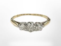 An antique 18ct gold three stone diamond ring, approx. 0.