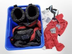 A pair of Hunter snow boots, England football shirts, Berghaus outdoor jacket.