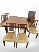 A late Victorian mahogany and satin wood inlaid extending dining table, with winder,