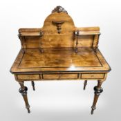A 19th century continental burr walnut writing table,