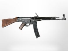 A Denix non-functioning metal copy of a German WWI MP44/STG44 assault rifle, length 94cm.