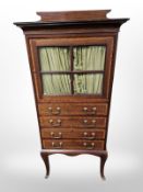 A Victorian mahogany and satinwood banded side cabinet,