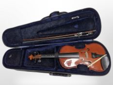 A Primavera 1/4 size violin and bow in case