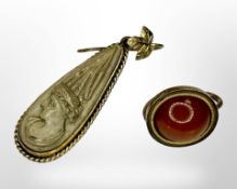 Two antique yellow gold earrings.