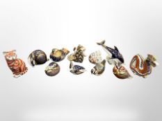 A group of Royal Crown Derby paperweight ornaments to include - Seahorse, Dragon, Dolphin, cat,
