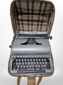A Torpedo typewriter in carry case.