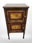 A Victorian walnut and beech double door pot cupboard,