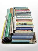 A collection of books relating to cricket.