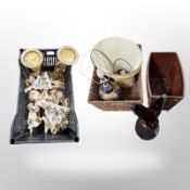 A group of continental porcelain and plaster cherub ornaments, pair of gilt candle stands,