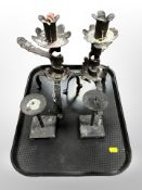 Two pairs of wrought-iron candlesticks, tallest 30cm.