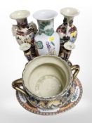 A group of 20th-century oriental porcelain and earthenware vases, jardiniere, pair of candlesticks,