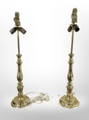 A pair of 20th century Scandinavian brass lamp bases with armorial lion finials,