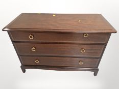 A Stag three drawer chest,