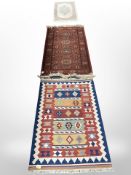 A machine made rug of Iranian design, a Kilim rug and a Chinese rug,