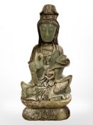 A Chinese carved jade figure of Guanyin,