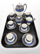 A Wedgwood 15-piece coffee service on cobalt blue ground, no. X9046.