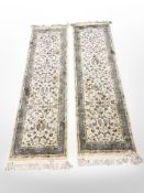 A pair of contemporary machine made Persian design runners on beige ground,