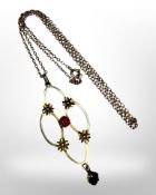 An antique yellow gold pendant on chain