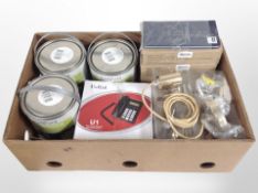 A group of new pendant light shade hangers, office phone, three tins of colours paint, etc.