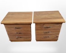 A pair of reproduction three drawer bedside chests,