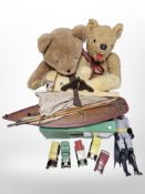 A group of teddy bears, painted wooden pond yacht, Batman action figure, etc.