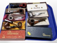 A collection of pipes in boxes.