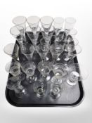 A group of crystal drinking glasses including etched examples, some with air-twist stems, etc.