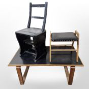 An ebonised metamorphic library step chair,