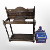 An Edwardian oak barley-twist umbrella stand, width 70cm, together with a small painted box.