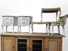 A group of French cream and gilt furniture comprising pair of two drawer bedside cabinets,