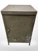 An enameled metal cabinet,