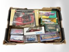 A group of boxed die-cast cars including Burago BMW M roadster,
