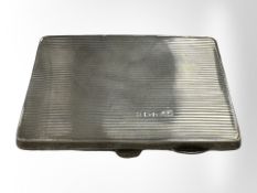 An antique silver card case, including silver pencil, Birmingham 1918 marks, 104.4g.