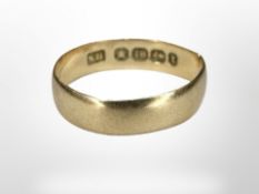 An 18ct gold band ring, misshapen CONDITION REPORT: 1.