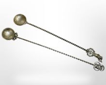Two ornate continental silver spoons.
