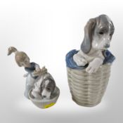 A Lladró figure of a puppy in basket, and a further figure 'Bashful Bather', No. 5455.