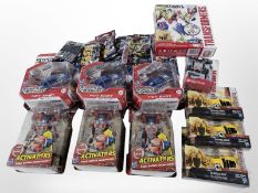 11 Hasbro Transformers figurines, plus six further miniatures in bags.