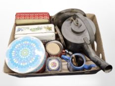 A galvanised watering can and other metal wares, tins, enamelled coffee pot, etc.