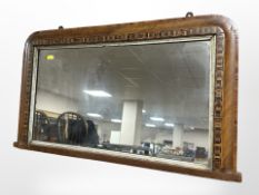 A Victorian inlaid walnut over mantle mirror,