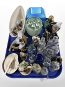 A group of antique glass bottles, Goebel figures, Chinese earthenware figures, Maling lustre bowl,