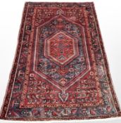 A Hamadan rug, North West Iran, 230cm x 143cm.