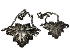 A fine pair of cast silver decanter labels for sherry and hock,