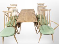An Ercol elm and beech drop leaf dining table,