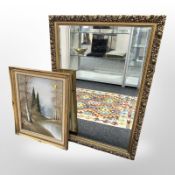 A contemporary gilt bevelled mirror 96 cm x 65 cm and a oil on canvas of a stream through a forest
