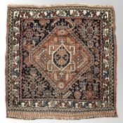 A small Kashgai rug, South-West Iran, 70cm x 66cm.
