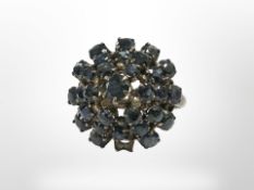 A 14ct gold sapphire cluster ring (one stone deficient),