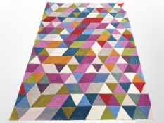 A contemporary machine-made multicoloured rug, 202cm x 160cm.