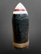 A British 25 Pounder armour-piercing shell, length 23cm.